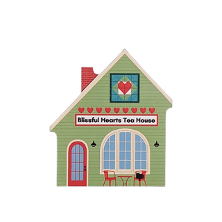 3/4" thick wooden illustration of a tea house with a heart design and 'Blissful Hearts Tea House' sign.