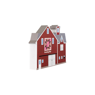 3/4" thick wooden illustration of a red barn with quilt design on a white background