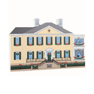 3/4" thick wooden Stylized illustration of a yellow house with black shutters and Christmas decor.