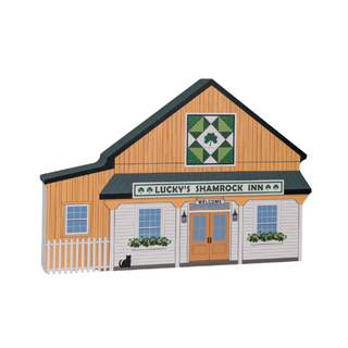 3/4" thick wooden illustration of a model of a building with 'Lucky's Shamrock Inn' sign on a white background