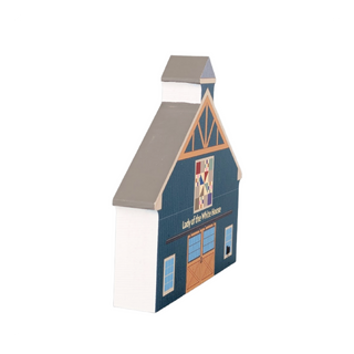 3/4" thick wooden illustration of a blue barn with quilt design and 'Lady of the White House' text on a white background