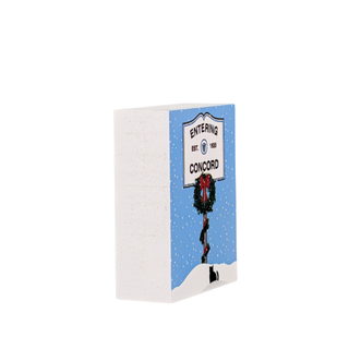 wooden replica with an illustration of a sign and wreath design on a white background