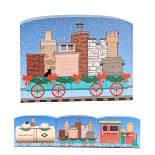 3/4" thick wooden replica with an illustration of a  Christmas-themed train with decorated cars and buildings on a snowy background.