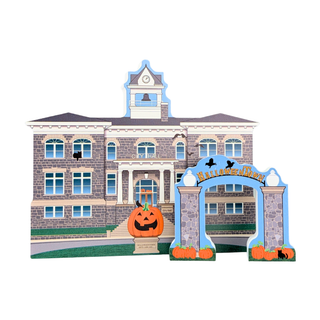 A Halloween-themed wooden cutout set featuring a multi-story brick schoolhouse, a large jack-o'-lantern pumpkin, and an arched gate with 'Halloween Party' written across the top, all on a plain white background.