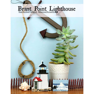 Decorative items including a lighthouse, anchor, rope, and plant on a blue background with 'Brant Point Lighthouse' text.