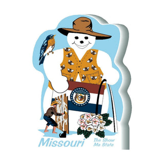 3/4" thick wooden Illustration of a snowman in Missouri-themed attire with a robin, wooden post, and flowers.