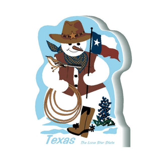 3/4" thick wooden cutout of aSnowman in cowboy attire with Texas flag, lasso, and bluebonnet on a white background