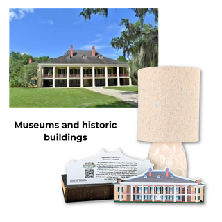 Lamp with decorative building model and text card on a white background, featuring a large house in the background.