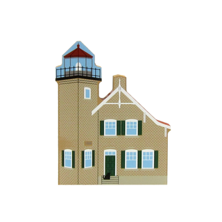 3/4" thick wooden Illustration of a lighthouse with a brick building and green shutters on a white background