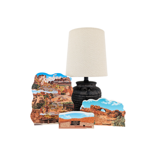 3/4" thick wooden illustration of the Arches map in Utah with lamp on white background