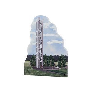 3/4" thick wooden cutout of a tall building with trees and sky in the background