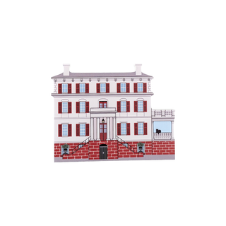 3/4" wooden replica with an illustration of three story white house with brick accents and red shutters 