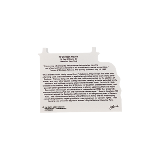 back of product with black text about the m'clintock house on a white background 