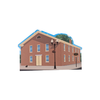 3/4" wooden replica with an illustration of a brick building with a street lamp on a white background