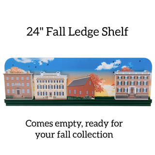 24" Fall Ledge Shelf with decorative houses and trees on a white background