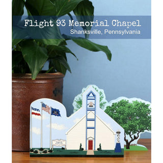 3/4" thick wooden cutout l of a chapel with flags on a card, labeled 'Flight 93 Memorial Chapel, Shanksville, Pennsylvania'.