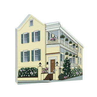 3/4" thick wooden Illustration of a yellow house with white trim and a porch.