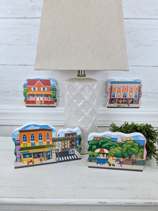5 piece set of 3/4" thick wooden models depicting the PBS kids "Alma's Way". 