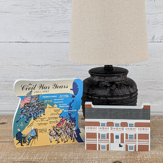 3/4" thick wooden illustrations of a brick house and a civil war map
