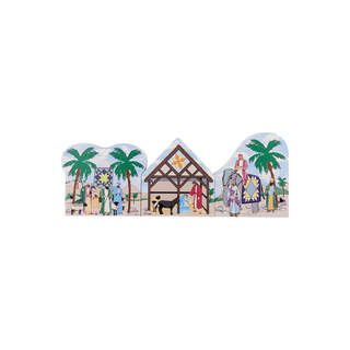 3/4" thick wooden illustrations of a nativity scene on display with a white background