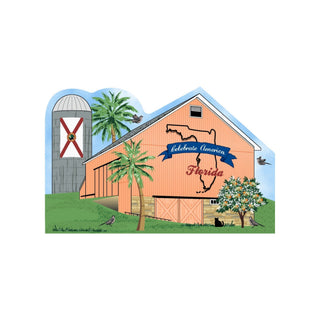 3/4" thick wooden Illustration of a barn with 'Celebrate America Florida' text, palm trees, and a silo with a flag.
