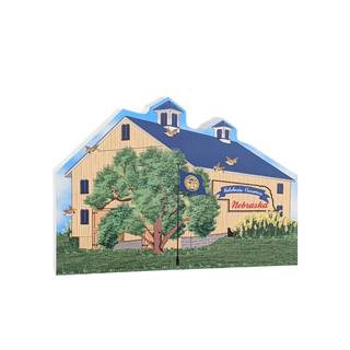 3/4" thick wooden Illustration of a barn with a tree and 'Nebraska' sign on a white background