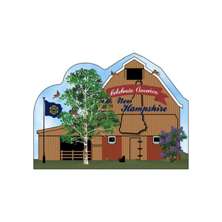 3/4" thick wooden Wooden barn with 'Celebrate America New Hampshire' sign, tree, and flag on a white background
