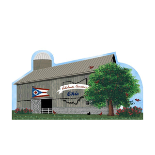 3/4" thick wooden cutout of a barn with a tree, flag, and 'Celebrate America Ohio' text on a blue background.