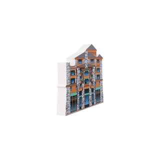 3/4" wooden replica with an illustration of a building with architectural details on a white background