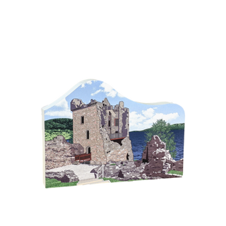 3/4" thick wooden cutout of a Stone castle with a scenic background on a decorative card