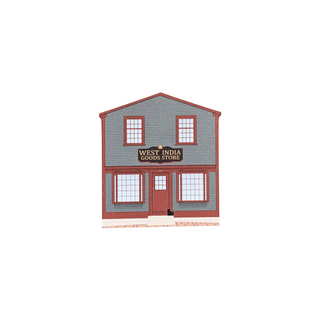 3/4" wooden replica with an illustration of a two-story building with 'West India Goods Store' sign on a white background
