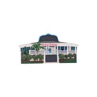 3/4" wooden replica with an illustration  of a house with a blue roof and white porch, featuring the brand 'Cheeburger'.