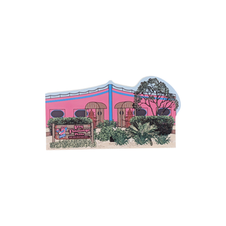3/4" wooden replica with an illustration  of a building with a sign in front on a white background