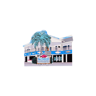 3/4" wooden replica with an illustration  of a building with a palm tree and 'The Timbers' sign.