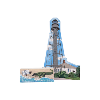 3/4" wooden replica with an illustration  of a Lighthouse with alligator warning sign and house in the background