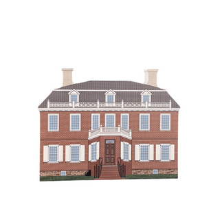 3/4" thick wooden cutout  of a two-story brick house with white trim and a balcony.