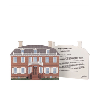 3/4" thick wooden cutout  of a two-story brick house with white trim and a balcony.