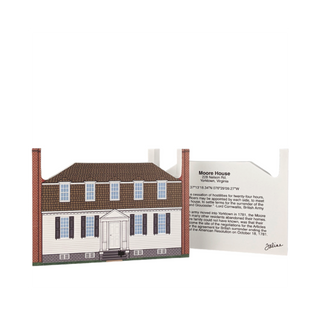3/4" thick wooden cutout of  a house with a plaque detailing historical information on a white background