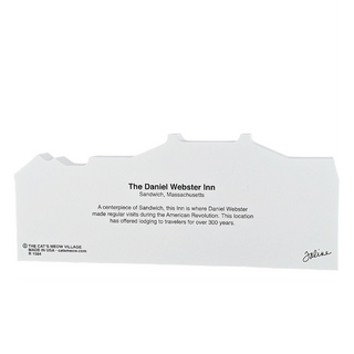 Wooden replica with text about The Daniel Webster Inn on a white background