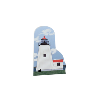 Lighthouse wooden replica with a blue sky and clouds background