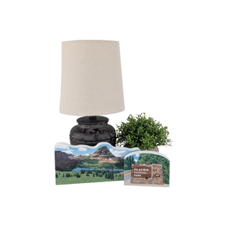 3/4" thick wooden illustrations of a mountain landscape with trees, lake and a sign on display