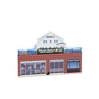 3/4" wooden replica with an illustration of a building with 'Dough Roller Pizza & Pancakes' sign on a white background