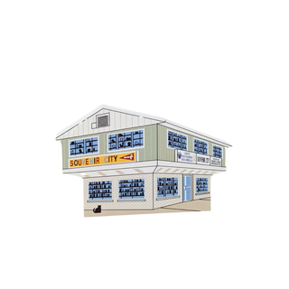 3/4" wooden replica with an illustration of a two-story building with a sign pointing to 'Sour City'.