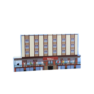 3/4" wooden replica with an illustration of a building with a Phillips 66 sign on a white background