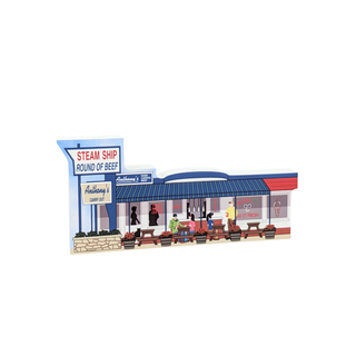 3/4" wooden replica with an illustration of a vintage butcher shop with people and a sign on a white background