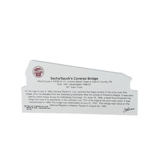3/4" thick wooden cutout  about Sachs/Sauk's Covered Bridge with text and a logo on a white background.