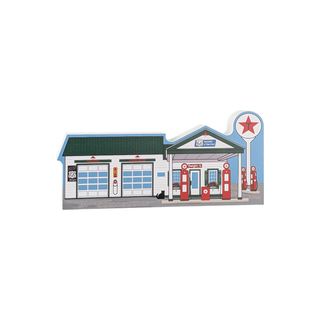 3/4" thick wood Model of a gas station with a star logo on a white background