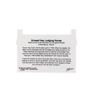 3/4" thick wooden souvenir of Grissell Hay Lodging House with text on a white background