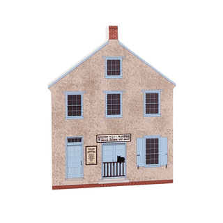 3/4" thick wooden illustration of a building on a white background