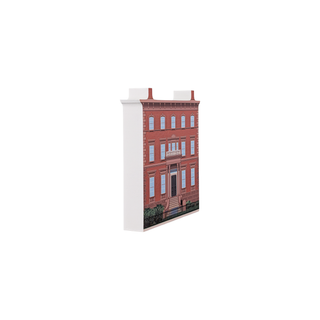 3/4" wooden replica with an illustration of a red brick building design on a white background